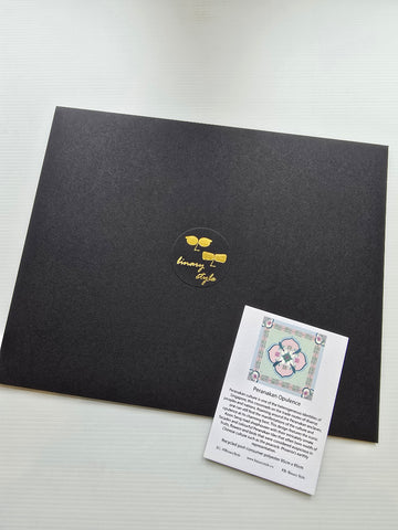 Black flat envelope and Story Card