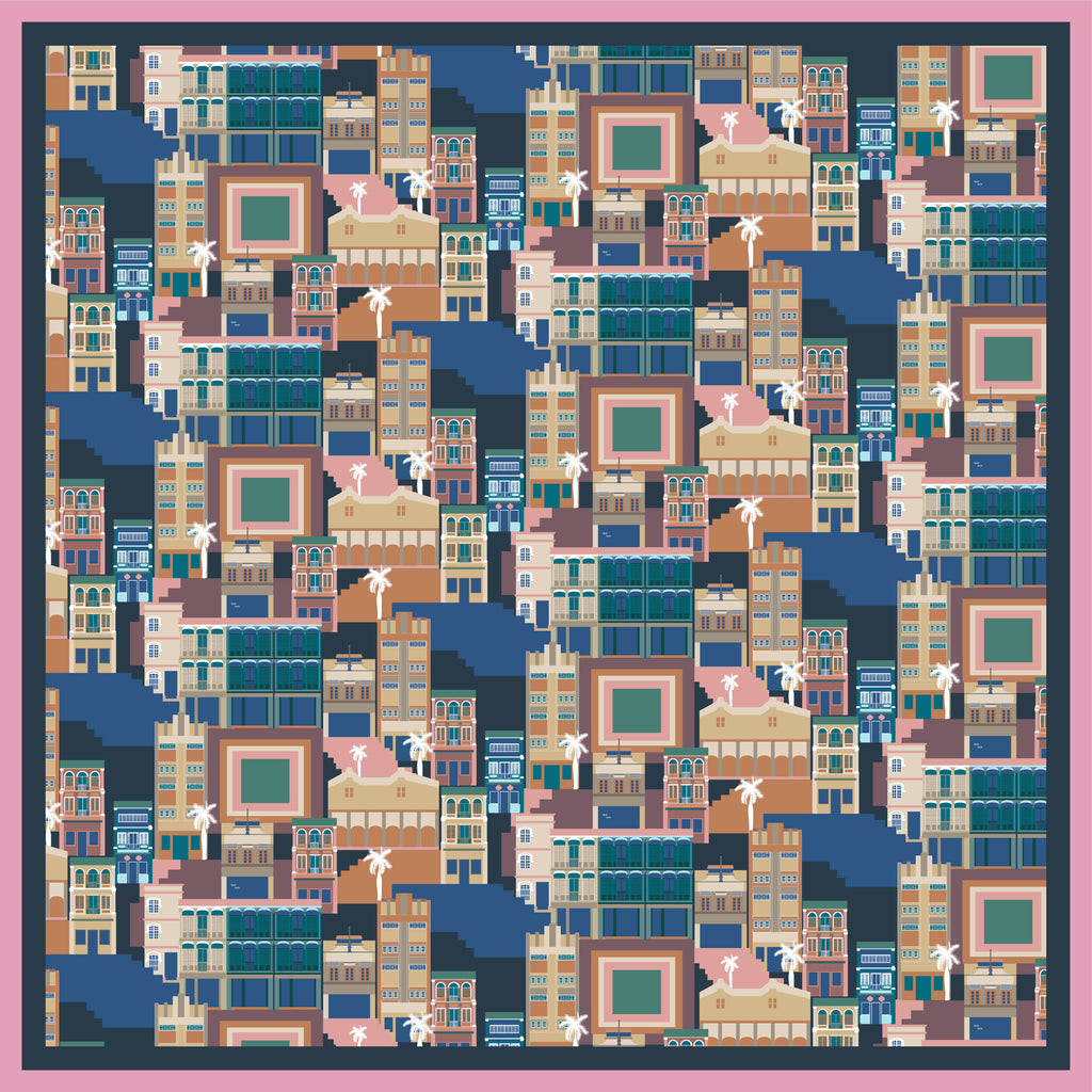 A silk scarf featuring a pattern inspired by Singapore's shophouses, with a colorful and detailed architectural design.
